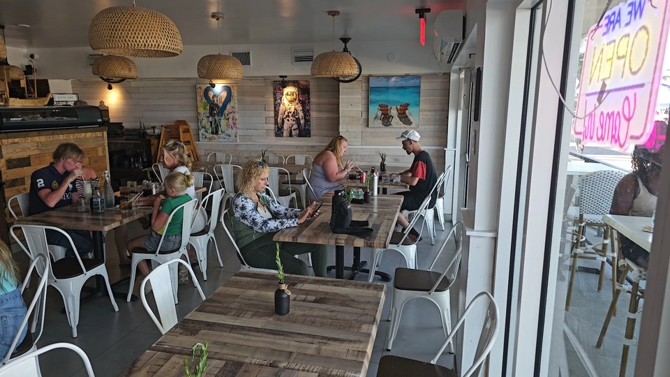 Casual dining room with bar seating.