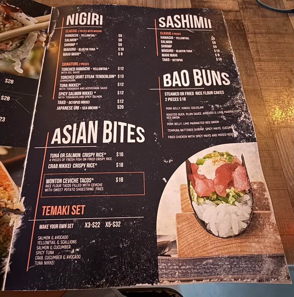 Menu page with Italian and seafood dishes.